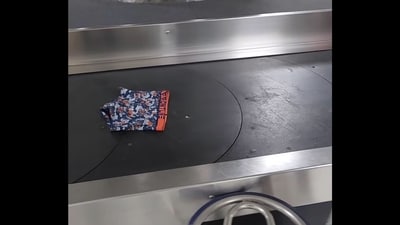 Boxers on the conveyor belt of the Delhi airport. (Instagram/@anupsoni3) Boxers on the conveyor belt of the Delhi airport. (Instagram/@anupsoni3)