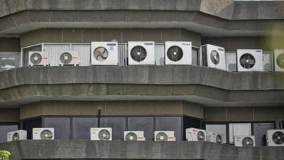 Air conditioners installed at a building near Jhandewalan, in New Delhi (Photo by Biplov Bhuyan/ Hindustan Times) Air conditioners installed at a building near Jhandewalan, in New Delhi (Photo by Biplov Bhuyan/ Hindustan Times)