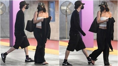 Kylie Jenner and Timothée Chalamet stepped out together to watch a movie. The couple matched each other's aesthetic for the outing. Kylie looked stunning in a tube top, low-waist flared pants, baseball cap, and flip-flops, while Timothée complemented her in a black sweatshirt, baggy shorts, baseball cap, and sneakers.&nbsp; (Instagram)