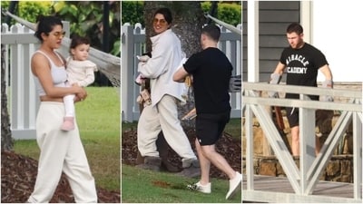 Priyanka Chopra, alongside Nick Jonas, Malti, her family, and friends, had a relaxing day at a friend's house on the Gold Coast, Australia. The actor embraced the lazy girl aesthetic in a stylish athleisure ensemble. She wore a cream-coloured cropped tank top, joggers, and a shacket. Grey uggs, sunglasses, and a messy updo rounded off the minimal look.&nbsp; (Instagram)