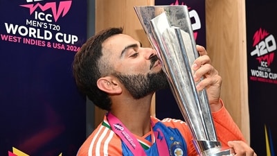 Virat Kohli poses for a picture with the trophy after Team India wins the ICC Mens T20 World Cup 2024 final match against South Africa at Kensington Oval in Barbados. (BCCI-X) Virat Kohli poses for a picture with the trophy after Team India wins the ICC Mens T20 World Cup 2024 final match against South Africa at Kensington Oval in Barbados. (BCCI-X)
