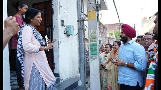 Congress’ Punjab president Amarinder Singh Raja Warring during a poll canvassing in Jalandhar.