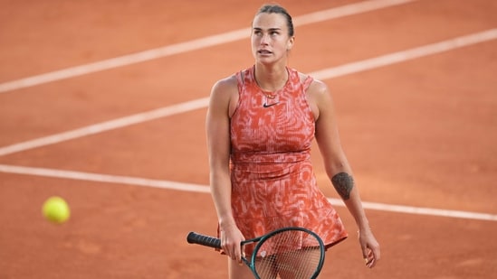 Belarus' Aryna Sabalenka reacts as she plays against Russia's Mirra Andreeva (AFP)