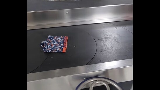Boxers on the conveyor belt of the Delhi airport. (Instagram/@anupsoni3)