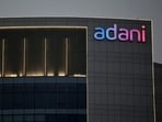The logo of the Adani Group is seen on the facade of one of its buildings on the outskirts of Ahmedabad, India.