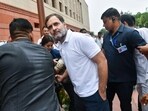 Opposition leader Rahul Gandhi, center, arrives at the parliament in New Delhi. Opposition leader Rahul Gandhi, center, arrives at the parliament in New Delhi.