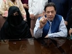 Pakistan's former Prime Minister Imran Khan, right, and Bushra Bibi,his wife. (AP/File) Pakistan's former Prime Minister Imran Khan, right, and Bushra Bibi,his wife. (AP/File)