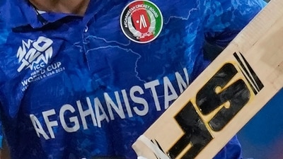 Afghanistan team logo is seen on a player's uniform during the men's T20 World Cup cricket match between Afghanistan and Bangladesh (AP) Afghanistan team logo is seen on a player's uniform during the men's T20 World Cup cricket match between Afghanistan and Bangladesh (AP)