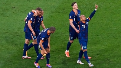 Donyell Malen of the Netherlands, right, celebrates after scoring his side's third goal during a round of sixteen match between Romania and the Netherlands at the Euro 2024 soccer tournament in Munich, Germany, Tuesday, July 2, 2024. (AP) Donyell Malen of the Netherlands, right, celebrates after scoring his side's third goal during a round of sixteen match between Romania and the Netherlands at the Euro 2024 soccer tournament in Munich, Germany, Tuesday, July 2, 2024. (AP)