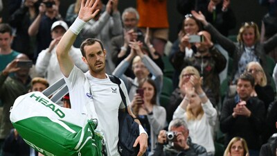 (FILES) Britain's Andy Murray waves as he leaves the court after his defeat against US player John Isner during their men's singles tennis match on the third day of the 2022 Wimbledon Championships at The All England Tennis Club in Wimbledon, southwest London, on June 29, 2022. Andy Murray has withdrawn from the men's singles at Wimbledon but has committed to competing in doubles with his brother Jamie, according to a statement from his management team on July 2, 2024. The 37-year-old two-time former champion, who was due to face Czech player Tomas Machac on the second day of the tournament, has taken the "very difficult decision" to pull out after failing to recover from back surgery. (Photo by SEBASTIEN BOZON / AFP) / RESTRICTED TO EDITORIAL USE (AFP) (FILES) Britain's Andy Murray waves as he leaves the court after his defeat against US player John Isner during their men's singles tennis match on the third day of the 2022 Wimbledon Championships at The All England Tennis Club in Wimbledon, southwest London, on June 29, 2022. Andy Murray has withdrawn from the men's singles at Wimbledon but has committed to competing in doubles with his brother Jamie, according to a statement from his management team on July 2, 2024. The 37-year-old two-time former champion, who was due to face Czech player Tomas Machac on the second day of the tournament, has taken the "very difficult decision" to pull out after failing to recover from back surgery. (Photo by SEBASTIEN BOZON / AFP) / RESTRICTED TO EDITORIAL USE (AFP)