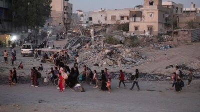Israeli forces bombed several areas of the southern Gaza Strip on Tuesday and thousands of Palestinians fled their homes (AP) Israeli forces bombed several areas of the southern Gaza Strip on Tuesday and thousands of Palestinians fled their homes (AP)