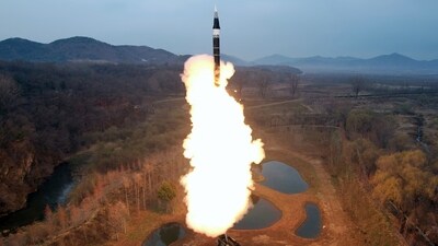 A missile is launched, as the state media reports North Korea test-fired a new mid- to long-range solid-fuel hypersonic missile, at an unknown location in North Korea (File via REUTERS)