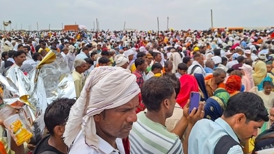 Hathras: Devotees at the religious gathering where a stampede broke out. (PTI) Hathras: Devotees at the religious gathering where a stampede broke out. (PTI)