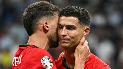 Portugal's Cristiano Ronaldo is consoled by Ruben Dias during their team’s win over Slovenia at the Euro 2024 last-16 stage. (AFP) Portugal's Cristiano Ronaldo is consoled by Ruben Dias during their team’s win over Slovenia at the Euro 2024 last-16 stage. (AFP)
