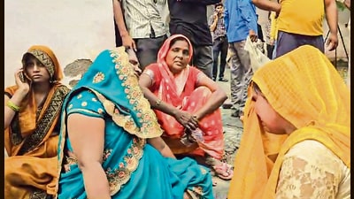 Relatives outside a Trauma Centre where victims of the Hathras's stampede in Etah on Tuesday. (PTI) Relatives outside a Trauma Centre where victims of the Hathras's stampede in Etah on Tuesday. (PTI)