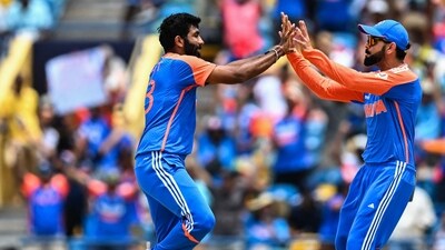 India's Jasprit Bumrah celebrates with teammate Virat Kohli during T20 World Cup final. (AFP) India's Jasprit Bumrah celebrates with teammate Virat Kohli during T20 World Cup final. (AFP)