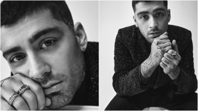 The second outfit features Zayn in a black sequinned blazer worn over a patterned black shirt and matching pants. While the jacket has notch lapel collars, silver sequin embellishments, and a sleek fit, the shirt has front button closures and a collared neckline. Statement rings, and a silver earring completed the look. (Instagram) The second outfit features Zayn in a black sequinned blazer worn over a patterned black shirt and matching pants. While the jacket has notch lapel collars, silver sequin embellishments, and a sleek fit, the shirt has front button closures and a collared neckline. Statement rings, and a silver earring completed the look. (Instagram)