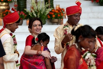 The image shows Nita Ambani with a bride. (special arrangement) The image shows Nita Ambani with a bride. (special arrangement)
