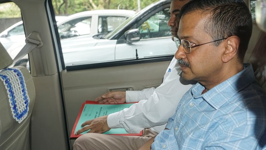 Delhi CM and AAP leader Arvind Kejriwal being brought to a court by CBI officials in connection with a money laundering case related to the Delhi liquor policy, in New Delhi, Saturday, June 29, 2024. (PTI)