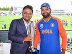 BCCI Secretary Jay Shah and India's captain Rohit Sharma pose for a picture with the trophy as they celebrate after beating South Africa by 7 runs in the ICC Men's T20 World Cup 2024 final match, at Kensington Oval in Barbados on Saturday. BCCI Secretary Jay Shah and India's captain Rohit Sharma pose for a picture with the trophy as they celebrate after beating South Africa by 7 runs in the ICC Men's T20 World Cup 2024 final match, at Kensington Oval in Barbados on Saturday.