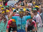 Britain's sprinter Mark Cavendish celebrates as crosses the finish line to win a record 35th Tour de France stage to break the record of Belgian legend Eddy Merckx in the fifth stage of the Tour de France 