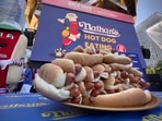 Nathan's hotdogs are displayed during a weigh-in ceremony before the Nathan's Famous July Fourth hot dog eating contest, Wednesday, July 3, 2024, in New York. (AP Photo/John Minchillo) Nathan's hotdogs are displayed during a weigh-in ceremony before the Nathan's Famous July Fourth hot dog eating contest, Wednesday, July 3, 2024, in New York. (AP Photo/John Minchillo)