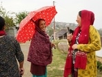 Naga women arrive to cast their votes in Chedema village, in the northeastern Indian state of Nagaland, Friday, April 19, 2024. (AP Photo/Yirmiyan Arthur)(AP)