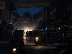 A dark street in a commercial area in Lahore, Pakistan.