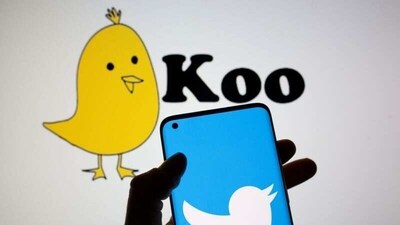 Twitter logo is seen on smartphone in front of displayed Koo app logo. (Reuters)