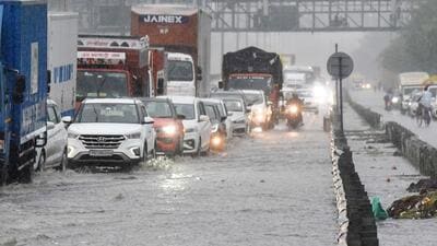 A waterlogged stretch of NH 48 near Narsinghpur village in Gurugram on Wednesday. (Parveen Kumar/HT Photo) A waterlogged stretch of NH 48 near Narsinghpur village in Gurugram on Wednesday. (Parveen Kumar/HT Photo)