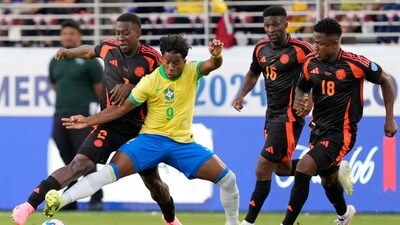 Brazil's Endrick (9), and Colombia's Carlos Cuesta, left, battle for the ball during a Copa America Group D soccer match (AP) Brazil's Endrick (9), and Colombia's Carlos Cuesta, left, battle for the ball during a Copa America Group D soccer match (AP)