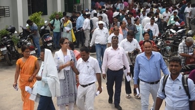 Candidates are seen leaving the exam venue after appearing for BPSC Headmaster exam 2024. The question papers have been released on bpsc.bih.nic.in. (Santosh Kumar) Candidates are seen leaving the exam venue after appearing for BPSC Headmaster exam 2024. The question papers have been released on bpsc.bih.nic.in. (Santosh Kumar)