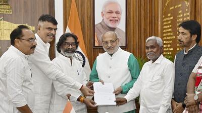 Champai Soren (right) tenders his resignation as chief minister to governor CP Radhakrishnan, with Hemant Soren present. (PTI) Champai Soren (right) tenders his resignation as chief minister to governor CP Radhakrishnan, with Hemant Soren present. (PTI)