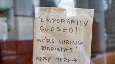 A "We're Hiring" sign in the window of a coffee shop in San Francisco, California, US. (Bloomberg) A "We're Hiring" sign in the window of a coffee shop in San Francisco, California, US. (Bloomberg)