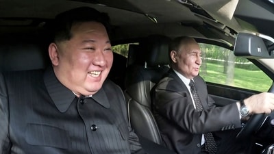 In this photo provided by the North Korean government, Russia's President Vladimir Putin, right, drives a car with North Korean leader Kim Jong Un sitting in front passenger seat at a garden of the Kumsusan State Guest House in Pyongyang, North Korea (AP) In this photo provided by the North Korean government, Russia's President Vladimir Putin, right, drives a car with North Korean leader Kim Jong Un sitting in front passenger seat at a garden of the Kumsusan State Guest House in Pyongyang, North Korea (AP)