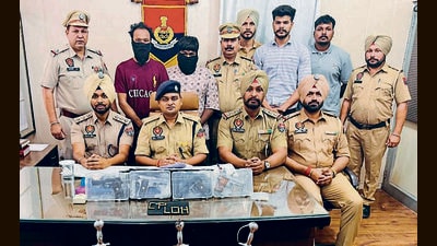 The accused in police custody in Ludhiana on Wednesday. (HT Photo) The accused in police custody in Ludhiana on Wednesday. (HT Photo)