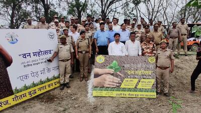 To mark the festival, around 150 people, including CISF personnel, ITBP personnel, school children, senior IFS officers, chief conservator of forests NK Janu, and local residents participated in planting sapling at the Surajpur wetland on Wednesday. (HT Photo) To mark the festival, around 150 people, including CISF personnel, ITBP personnel, school children, senior IFS officers, chief conservator of forests NK Janu, and local residents participated in planting sapling at the Surajpur wetland on Wednesday. (HT Photo)