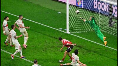 Turkey's goalkeeper Mert Gunok saves the ball during the UEFA Euro 2024 Round of 16 against Austria in Leipzig. (AFP) Turkey's goalkeeper Mert Gunok saves the ball during the UEFA Euro 2024 Round of 16 against Austria in Leipzig. (AFP)