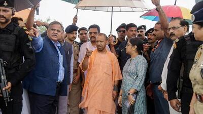 Uttar Pradesh chief minister Yogi Adityanath inspects the area in Hathras where the stampede took place. (ANI PHOTO) Uttar Pradesh chief minister Yogi Adityanath inspects the area in Hathras where the stampede took place. (ANI PHOTO)
