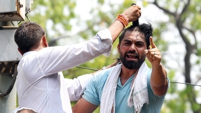 Raising slogans against the BJP-led Centre and the National Testing Agency (NTA), the student outfits of some INDIA bloc parties staged a protest against alleged irregularities in several competitive exams. (ANI ) Raising slogans against the BJP-led Centre and the National Testing Agency (NTA), the student outfits of some INDIA bloc parties staged a protest against alleged irregularities in several competitive exams. (ANI )