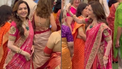 Nita Ambani opted for a pink and gold saree, and was the centre of all attention as she greeted guests on their arrival. Nita Ambani opted for a pink and gold saree, and was the centre of all attention as she greeted guests on their arrival.