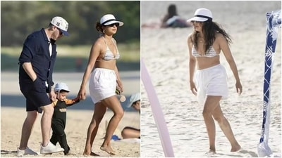 Priyanka Chopra and Nick Jonas took their daughter Malti for a beach outing in Australia. Priyanka embraced the beach vibes in a printed bikini top and white linen shorts. She accessorised the ensemble with a dainty chain, gold hoop earrings, a bracelet, rings, sunglasses, and a cap. (Instagram) Priyanka Chopra and Nick Jonas took their daughter Malti for a beach outing in Australia. Priyanka embraced the beach vibes in a printed bikini top and white linen shorts. She accessorised the ensemble with a dainty chain, gold hoop earrings, a bracelet, rings, sunglasses, and a cap. (Instagram)