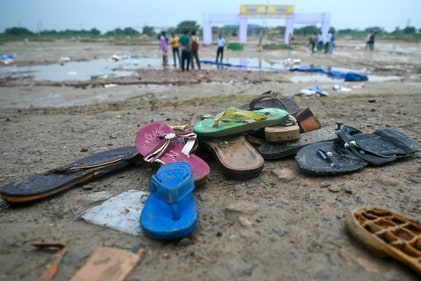 Shoes are pictured where a stampede killed people during a sermon at Hathras in Uttar Pradesh on July 3, 2024. (AFP) Shoes are pictured where a stampede killed people during a sermon at Hathras in Uttar Pradesh on July 3, 2024. (AFP)