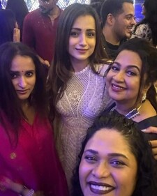 Trisha Krishnan posed with Radhika Sarathkumar at Varalaxmi Sarathkumar's wedding. Trisha Krishnan posed with Radhika Sarathkumar at Varalaxmi Sarathkumar's wedding.