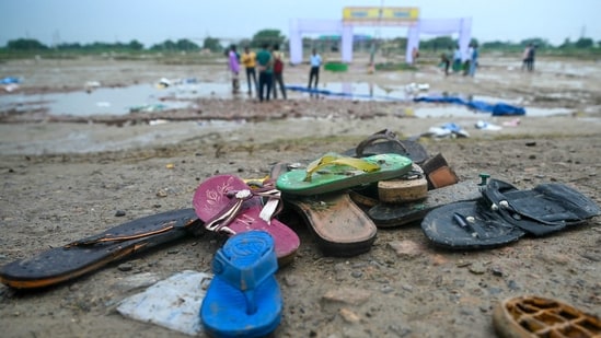 Shoes are pictured where a stampede killed people during a sermon at Hathras on July 3, 2024. (AFP)
