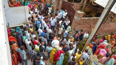 Hathras: Relatives mourn at the residence of three members of their family who died in the recent stampede at the 'satsang' of Baba Narayan Hari. (PTI file photo) Hathras: Relatives mourn at the residence of three members of their family who died in the recent stampede at the 'satsang' of Baba Narayan Hari. (PTI file photo)