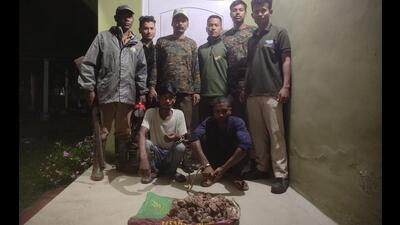 Poachers after their arrest in Assam. (Sourced image.) Poachers after their arrest in Assam. (Sourced image.)