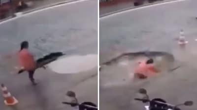 A viral video shows a woman falling into a sinkhole. (X/@GuptaPragnya)