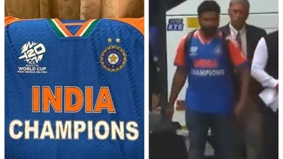 A specially designed 'champions' jersey was presented to the Indian cricketers for their meeting with PM Narendra Modi A specially designed 'champions' jersey was presented to the Indian cricketers for their meeting with PM Narendra Modi