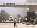 People outside the reactor pharma unit of pharmaceutical company Escientia where a fire broke out following an explosion, in Anakapalle, Andhra Pradesh. People outside the reactor pharma unit of pharmaceutical company Escientia where a fire broke out following an explosion, in Anakapalle, Andhra Pradesh.